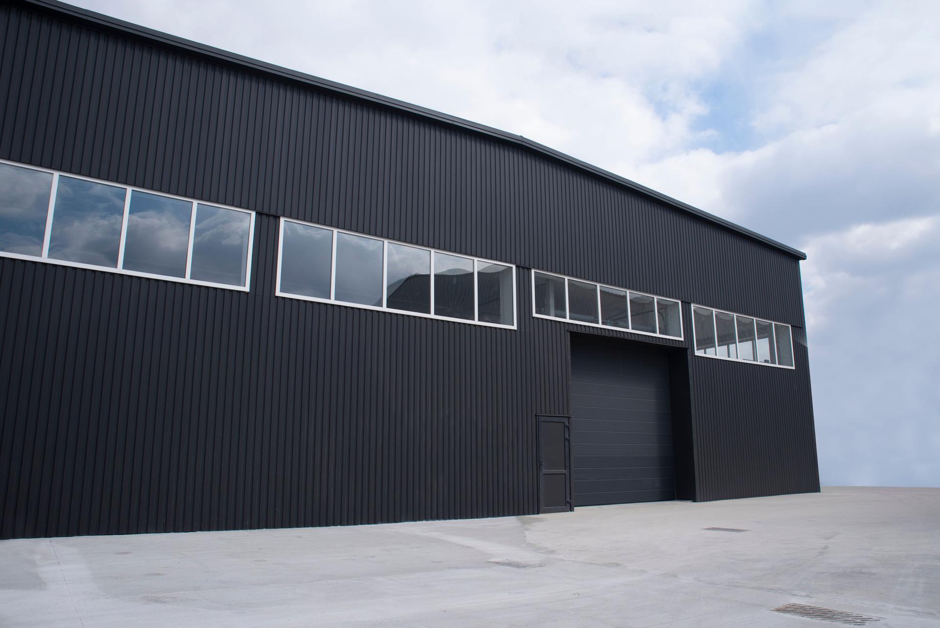 Warehouse building exterior with automatic gate